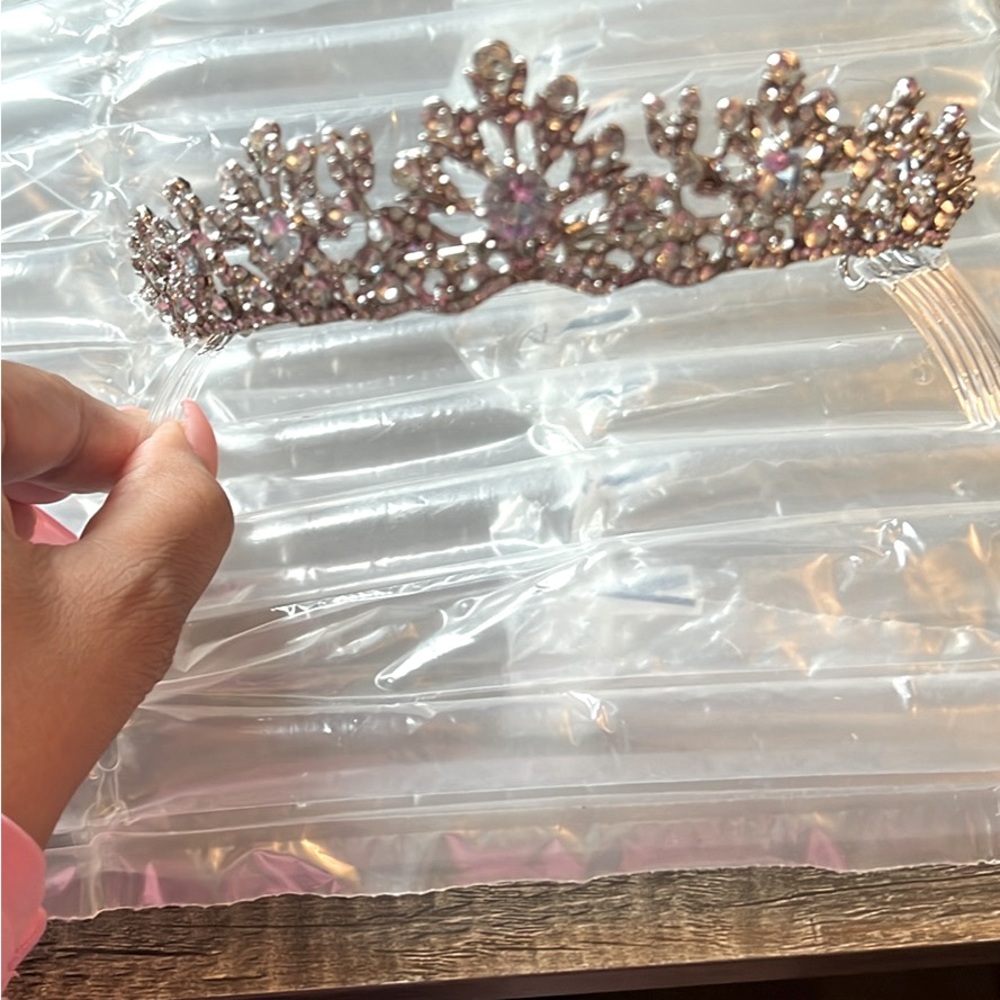 Sliver toned rhinestone tiara. Used once. Detachable combs